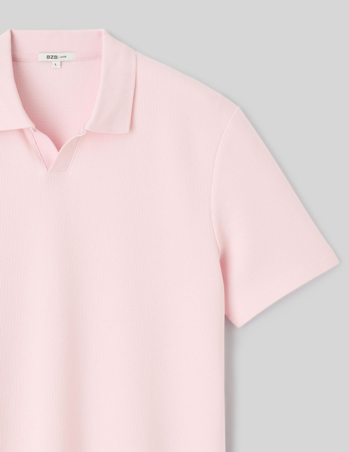 Polo mati&egrave;re gaufr&eacute;e