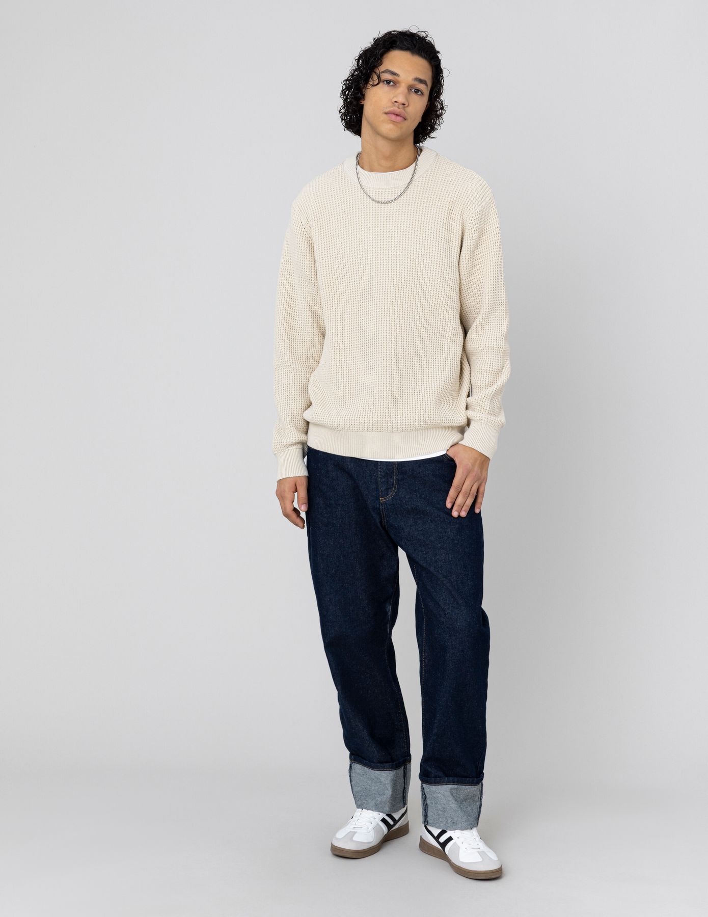 Pull col rond matière fantaisie