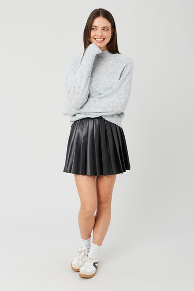 Jupe plissée en tissu enduit