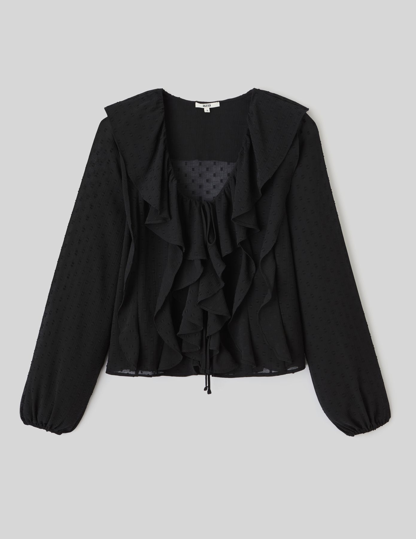Blouse plumetis à volants