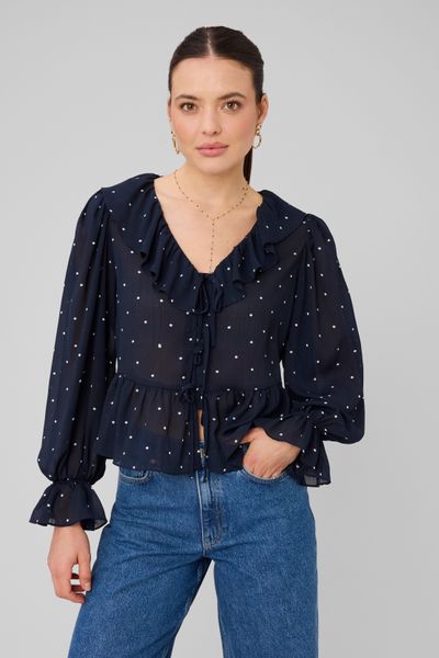 Blouse &agrave; volants motif pois