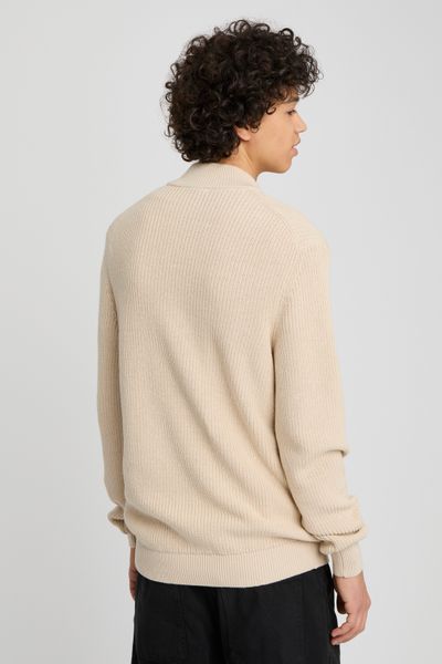 Pull avec col montant zippé