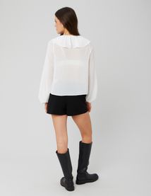 Blouse plumetis à volants