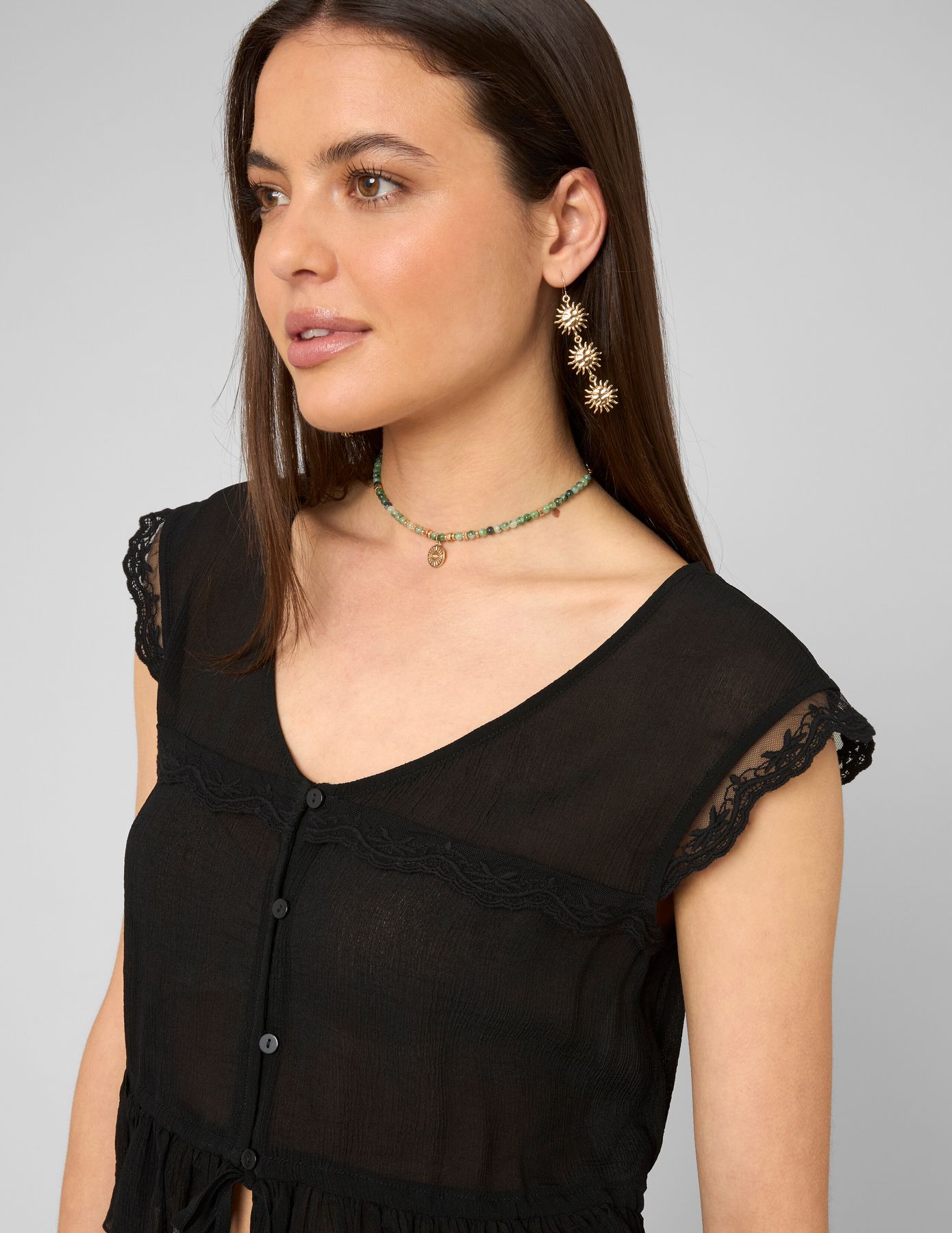 Blouse sans manches &agrave; volants