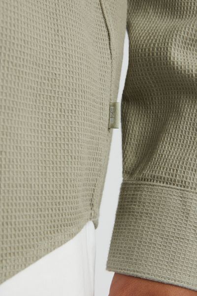 Surchemise unie gaufr&eacute;e