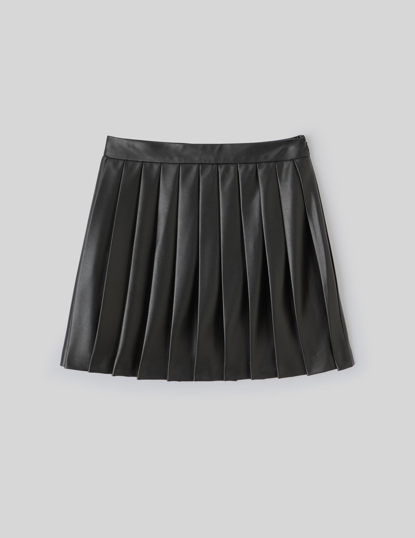 Jupe plissée en tissu enduit