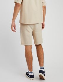 Bermuda unie en mati&egrave;re gaufr&eacute;