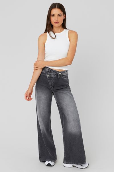 Jean wide leg ceinture asym&eacute;trique