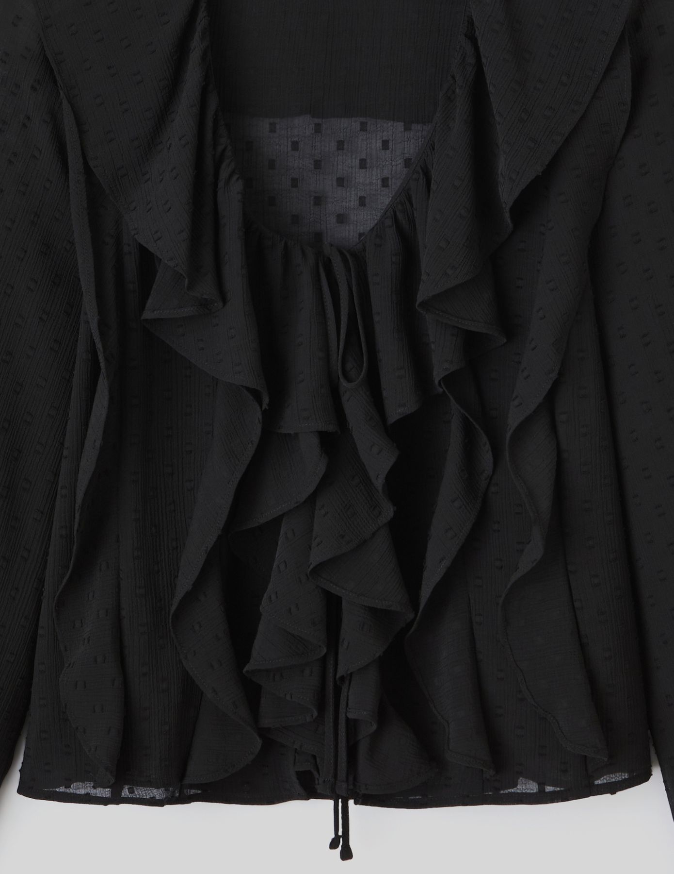 Blouse plumetis à volants