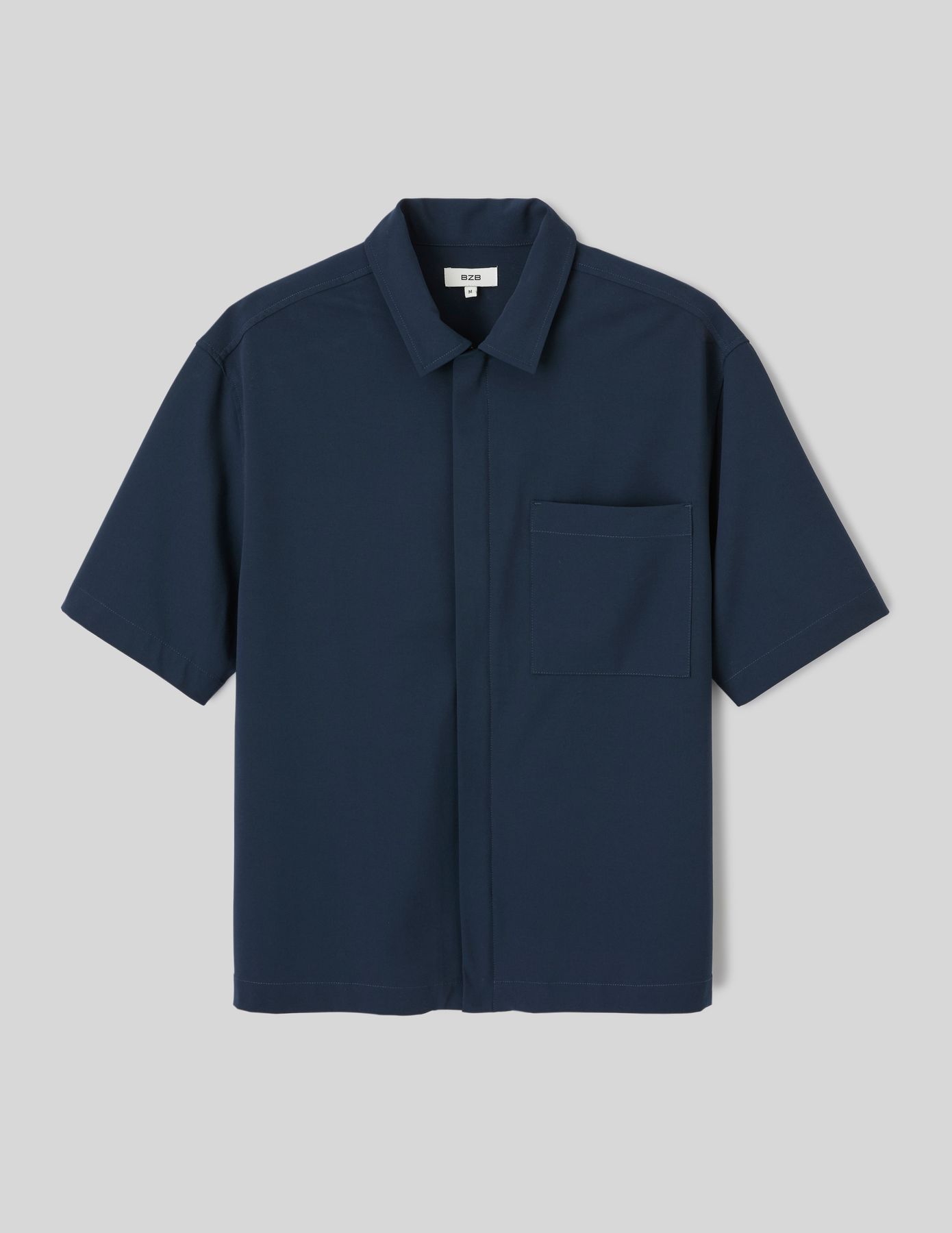 Chemise zipp&eacute;e manches courtes