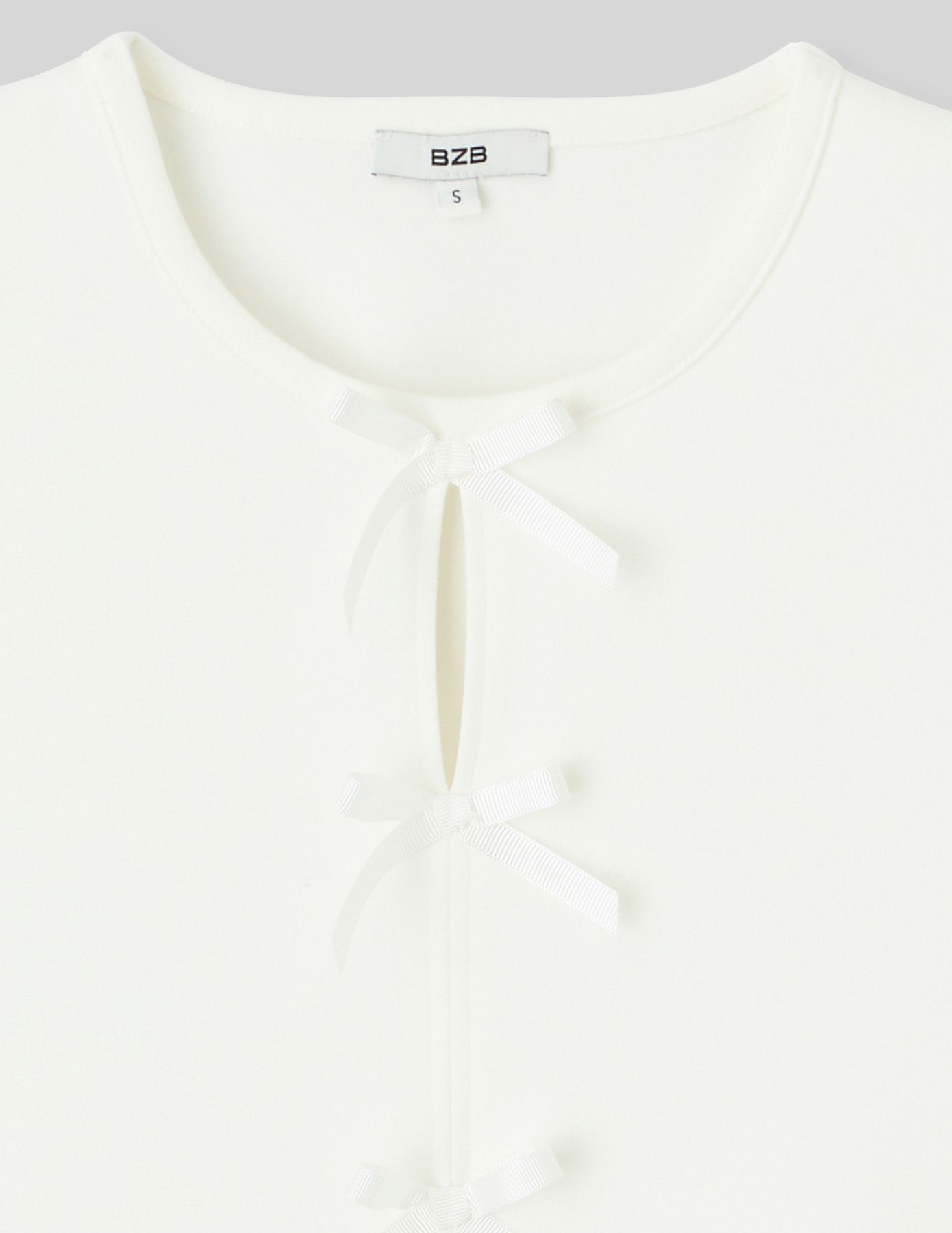 Top sans manches &agrave; n&oelig;uds