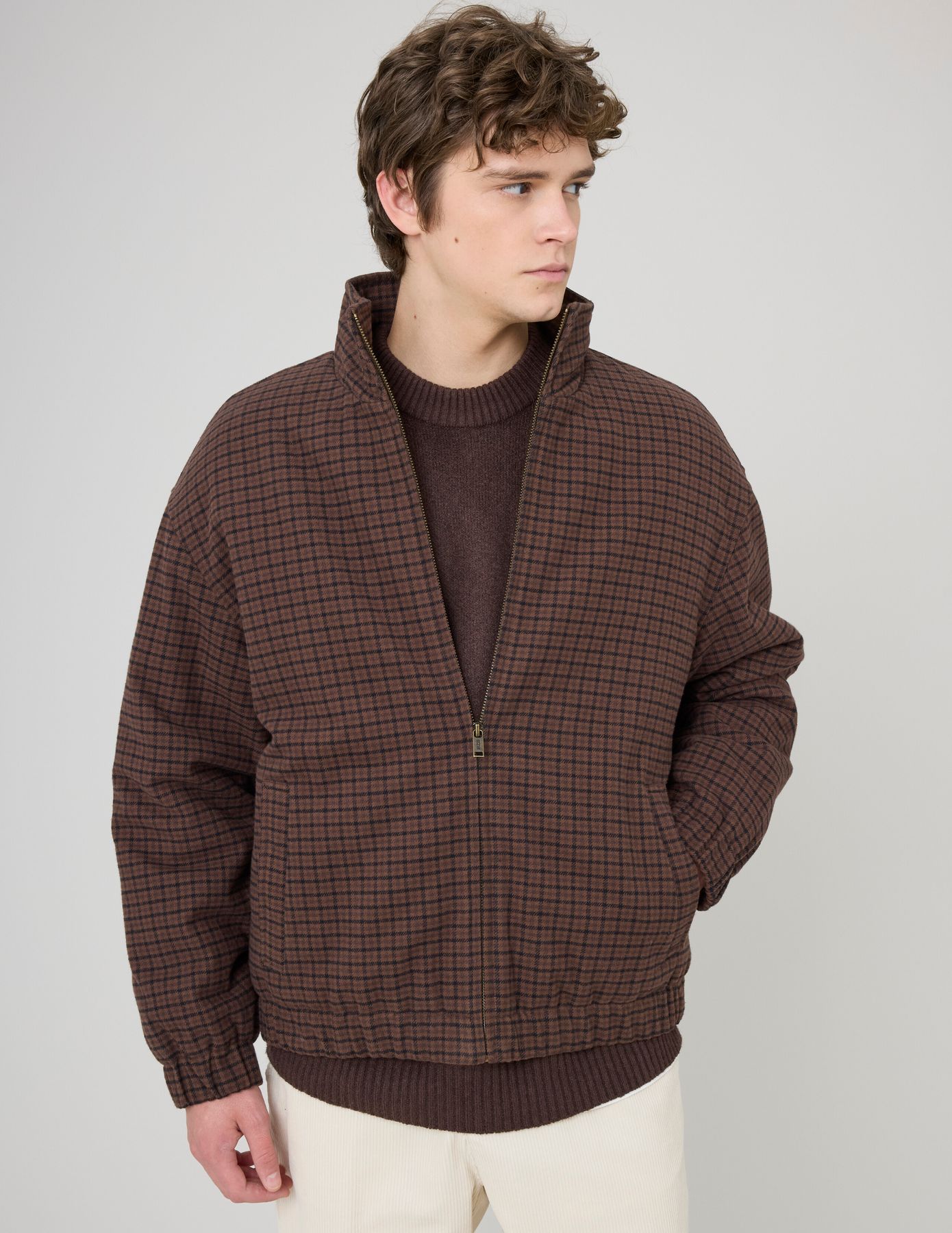 Blouson zippé à carreaux