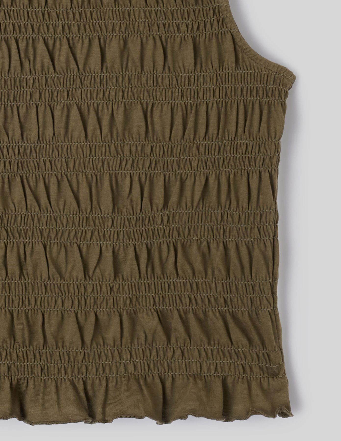 Top sans manche smock&eacute;