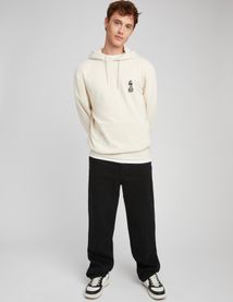 Sweat à capuche broderie poitrine