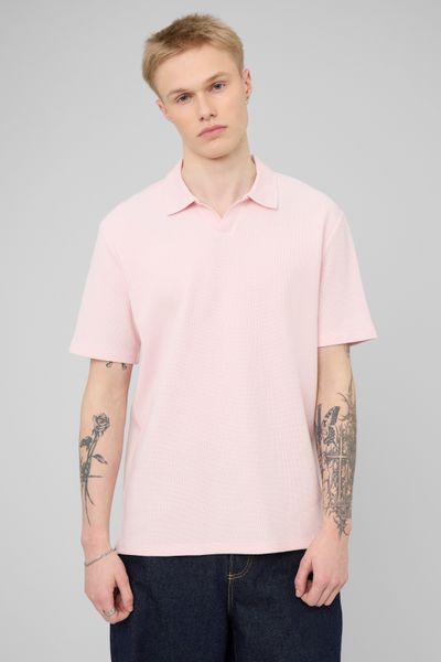 Polo mati&egrave;re gaufr&eacute;e