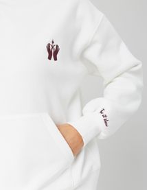 Sweat col capuche broderie poitrine