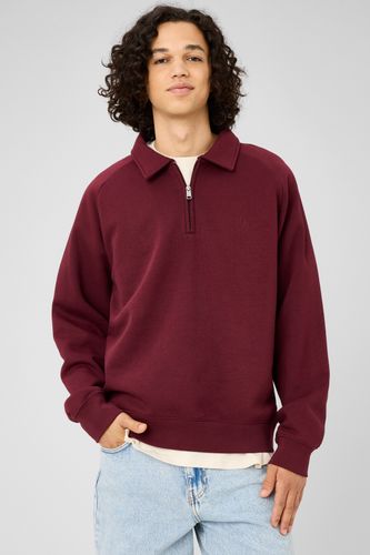 Sweat col polo zippé