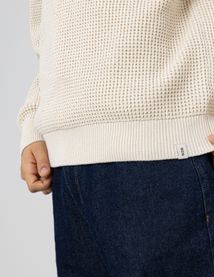 Pull col rond matière fantaisie