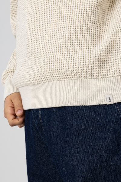 Pull col rond matière fantaisie