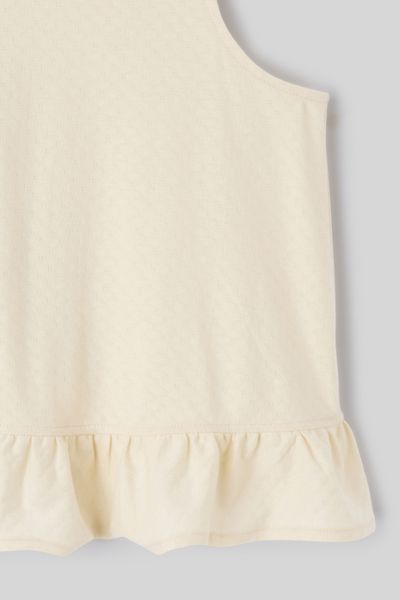 Top avec n&oelig;uds au dos