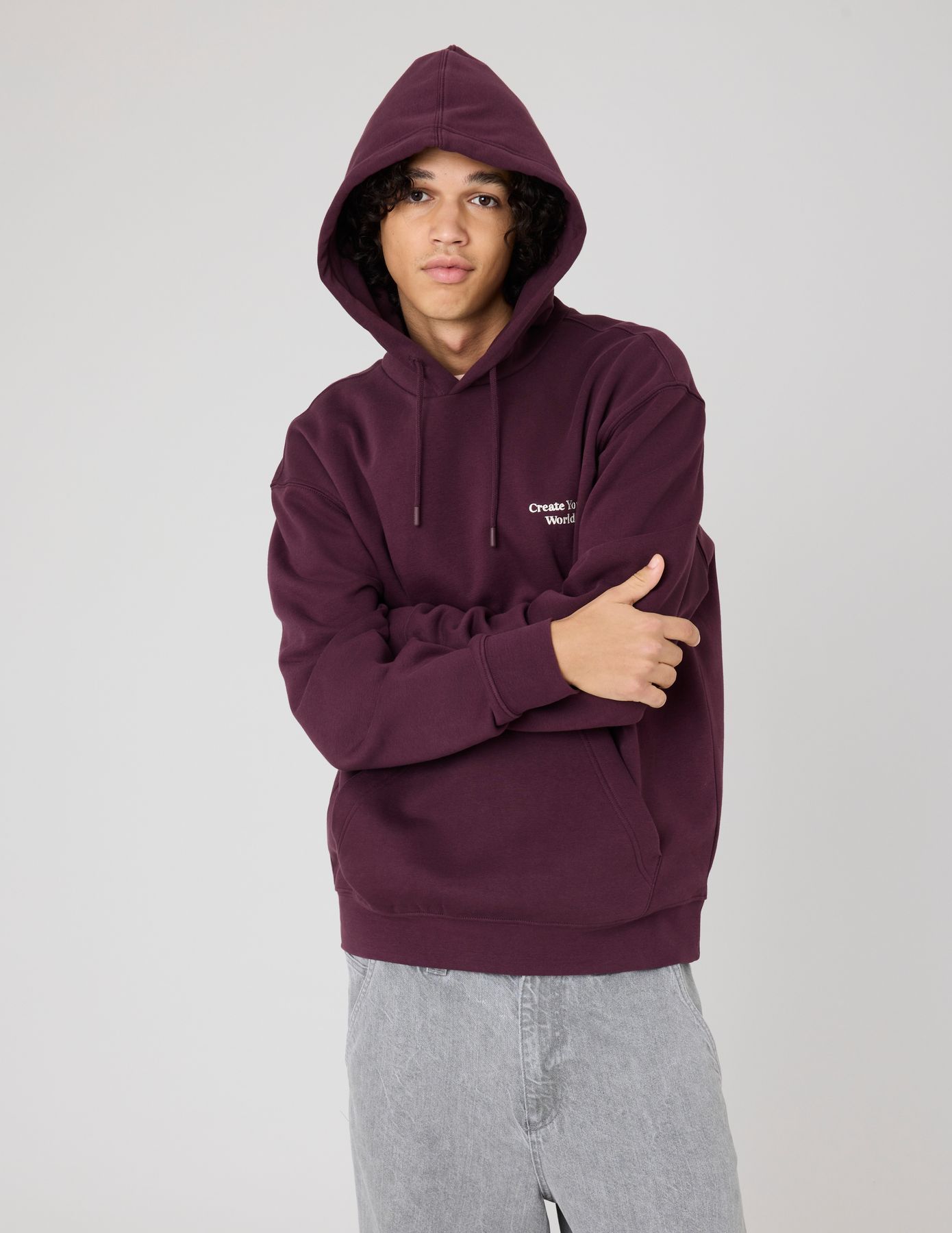 Sweat à capuche message brodé