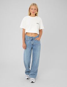 Jean straight ceinture asym&eacute;trique