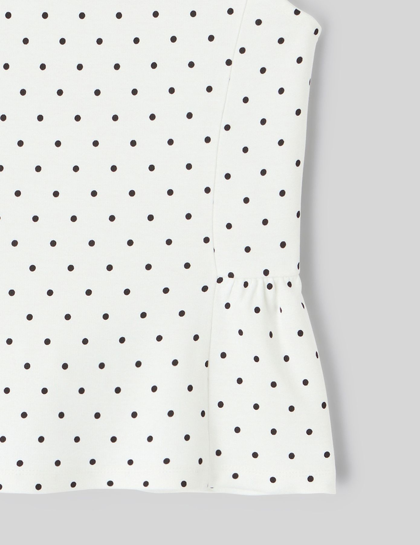 D&eacute;bardeur p&eacute;plum &agrave; pois