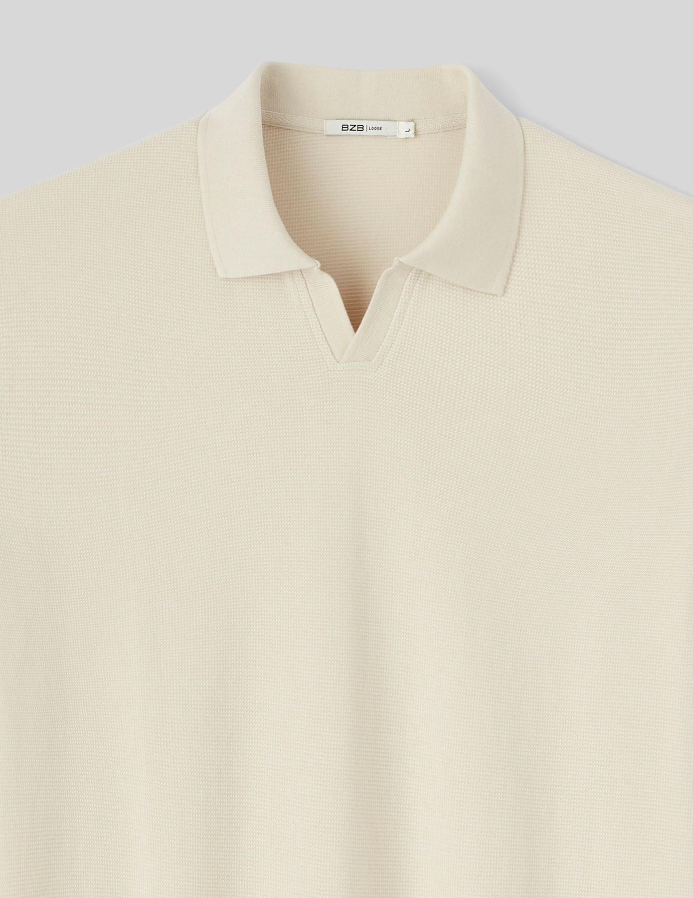 Polo matière fantaisie