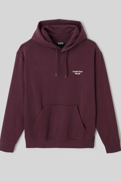 Sweat à capuche message brodé