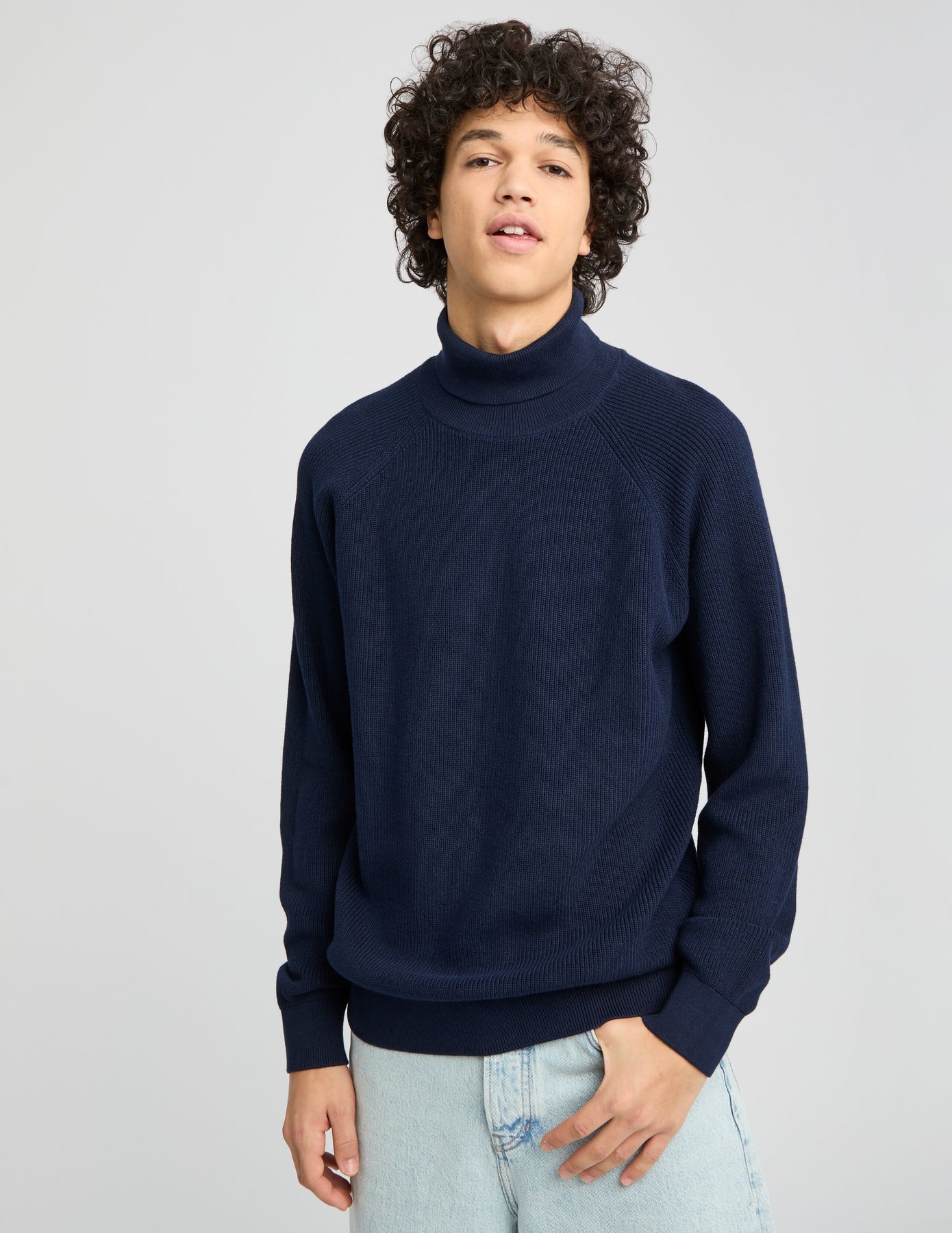 Pull col roulé