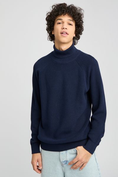 Pull col roulé