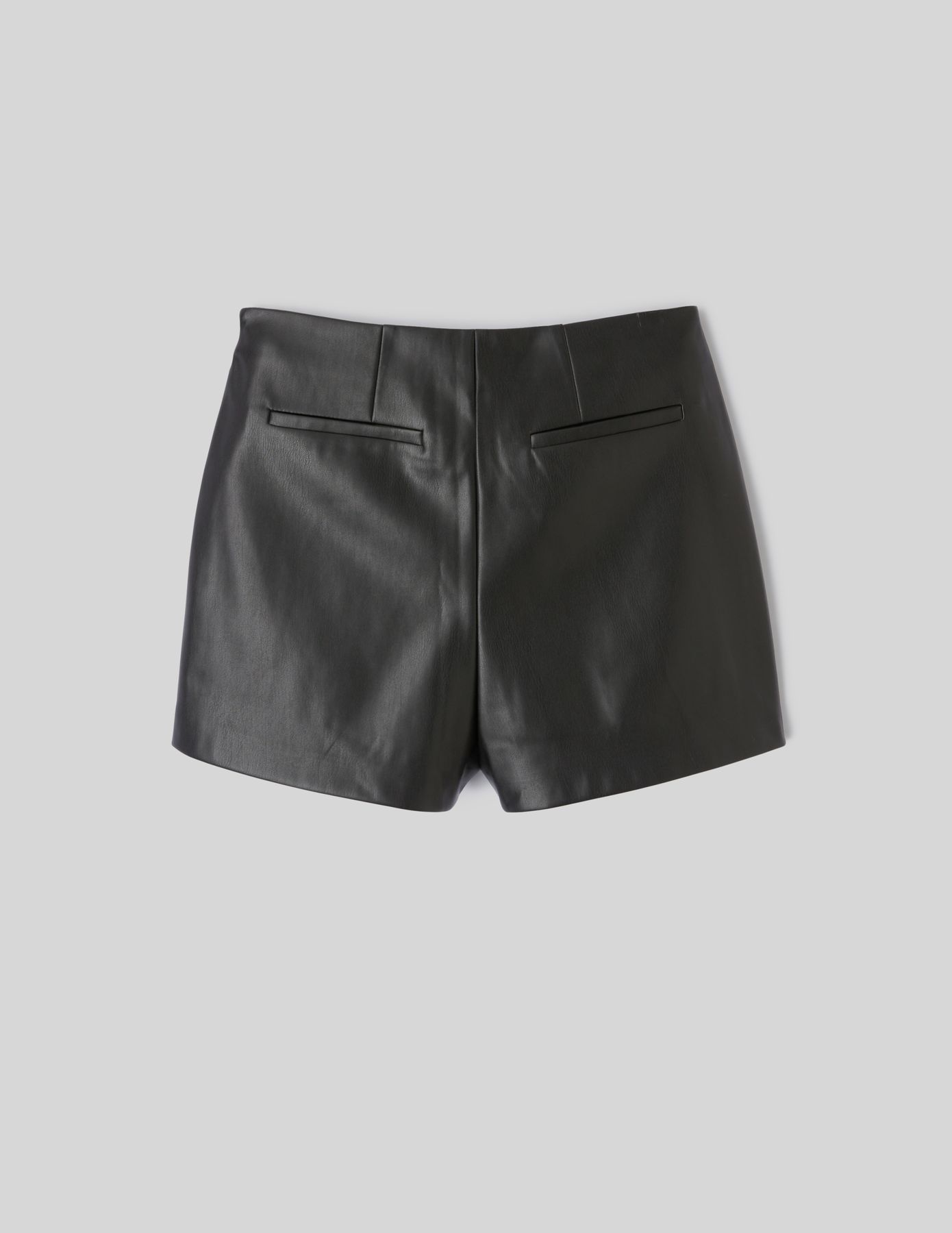 Jupe short en tissu enduit