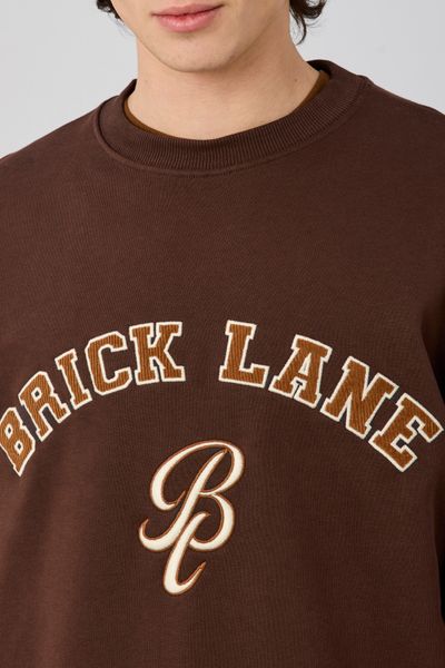 Sweat broderie poitrine