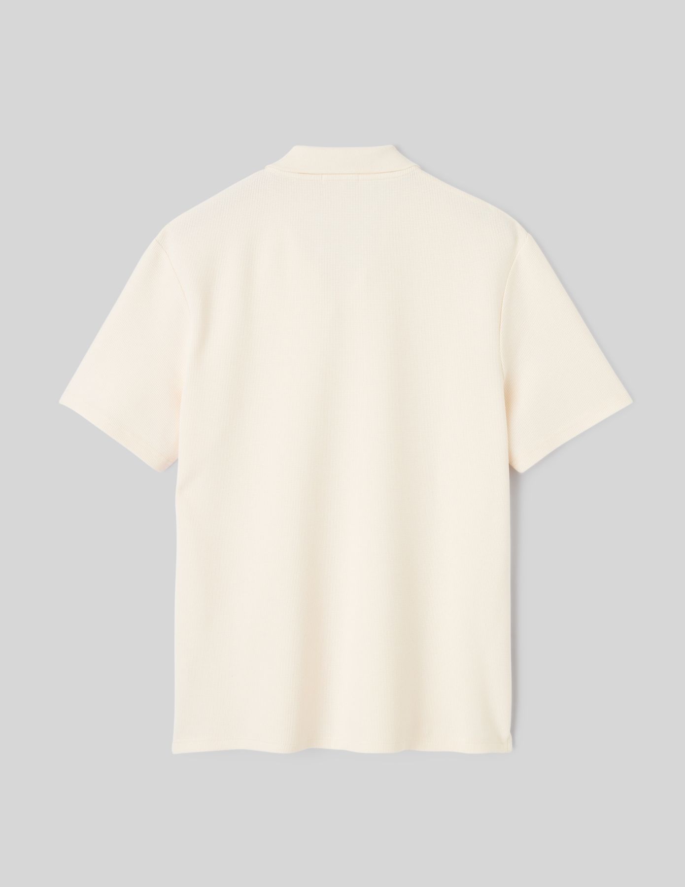 Polo mati&egrave;re gaufr&eacute;e