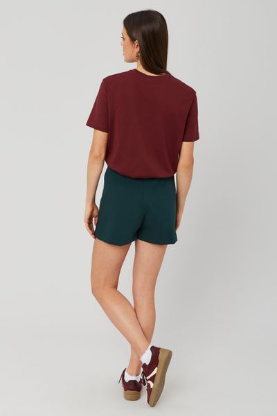 Jupe short portefeuille avec bouton doré