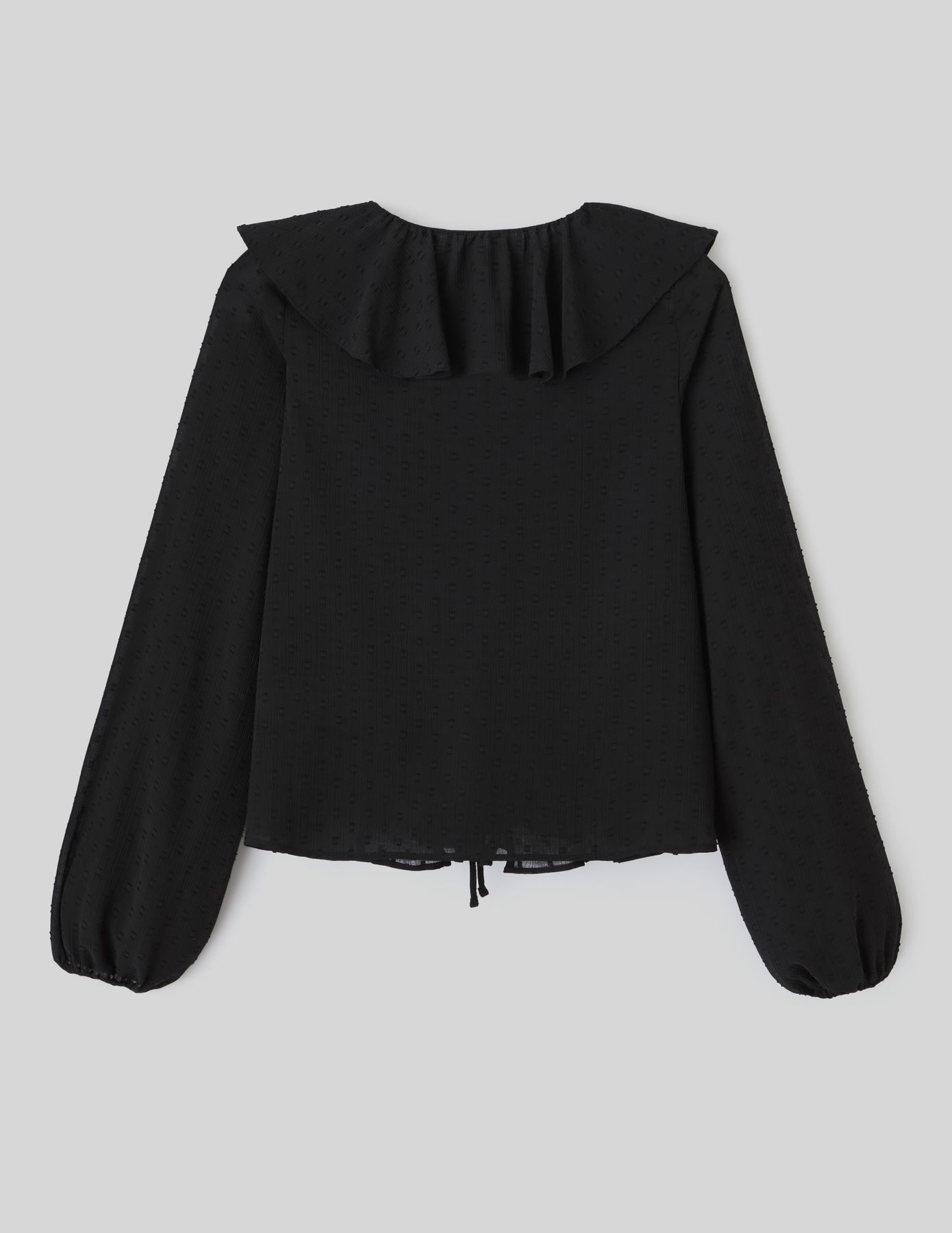 Blouse plumetis à volants