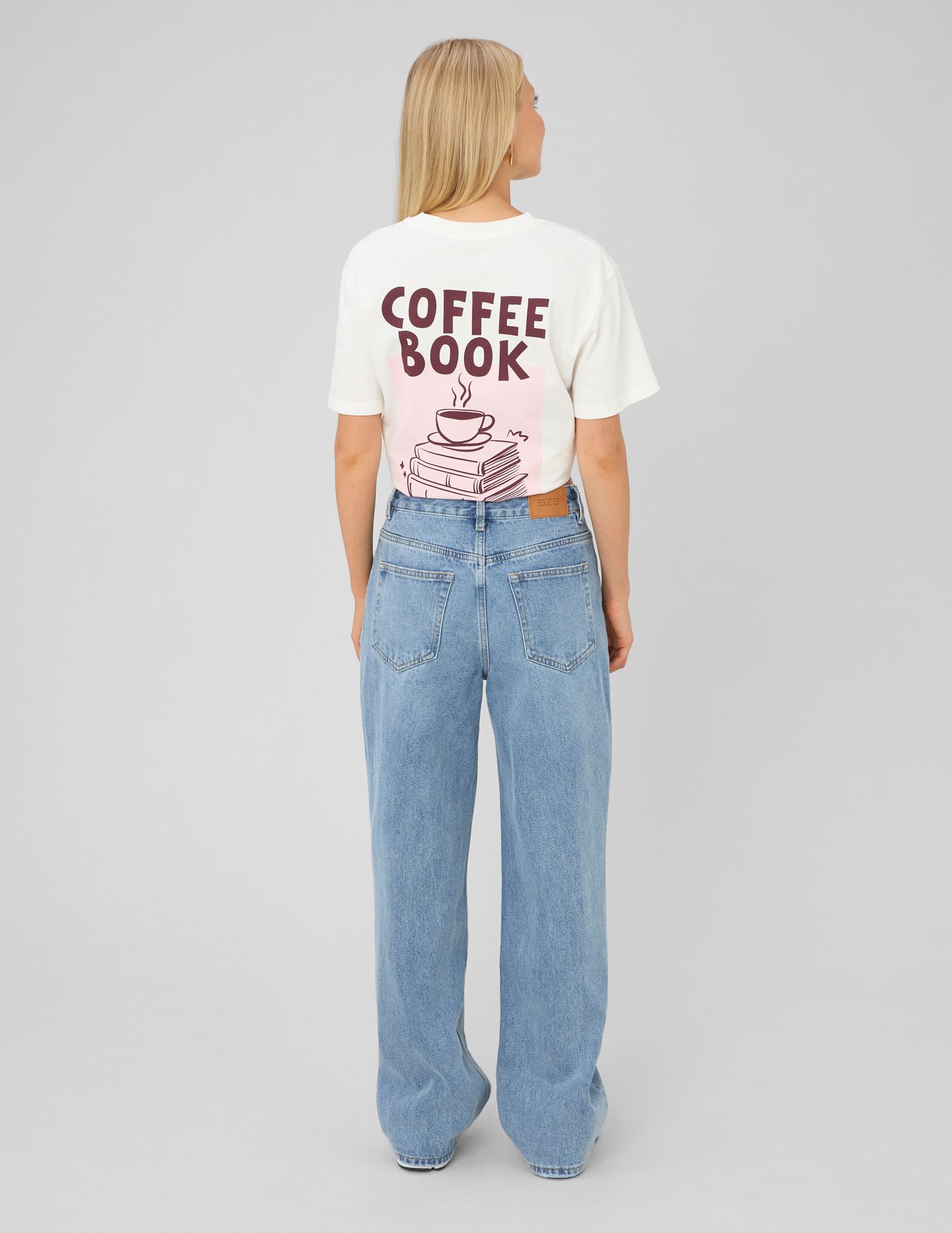 Jean straight ceinture asym&eacute;trique
