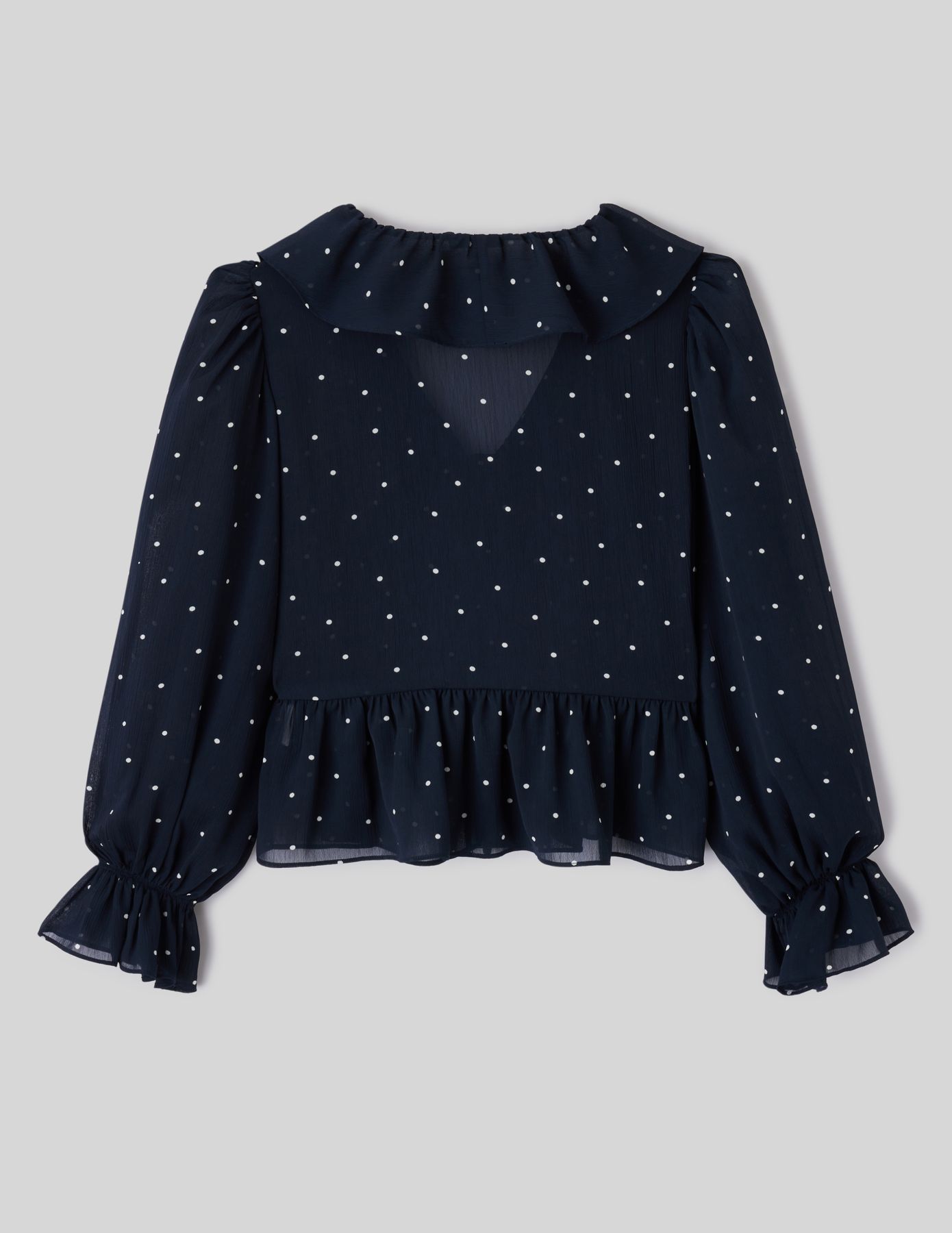 Blouse &agrave; volants motif pois