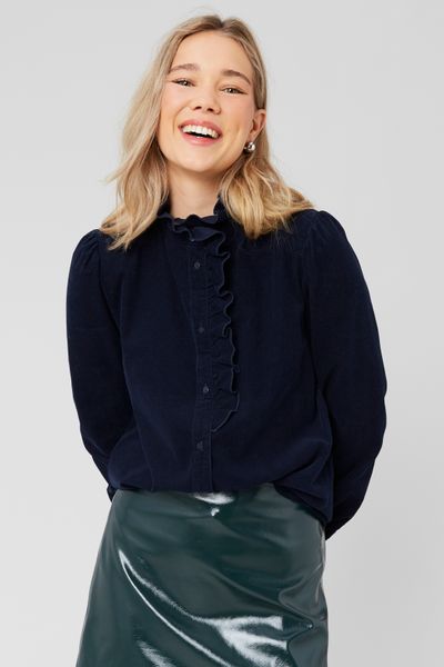Blouse col montant en velours côtelé
