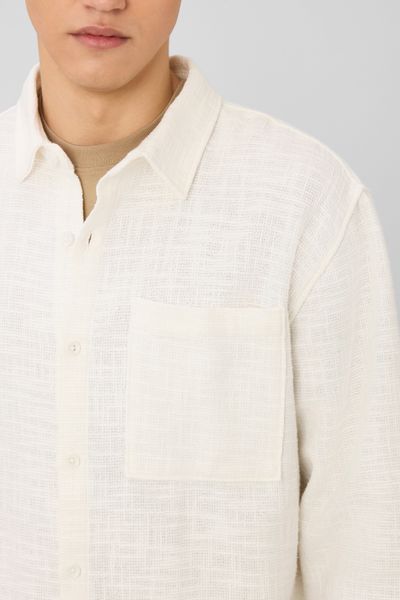 Surchemise unie mati&egrave;re fantaisie