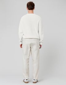 Pull col rond matière fantaisie