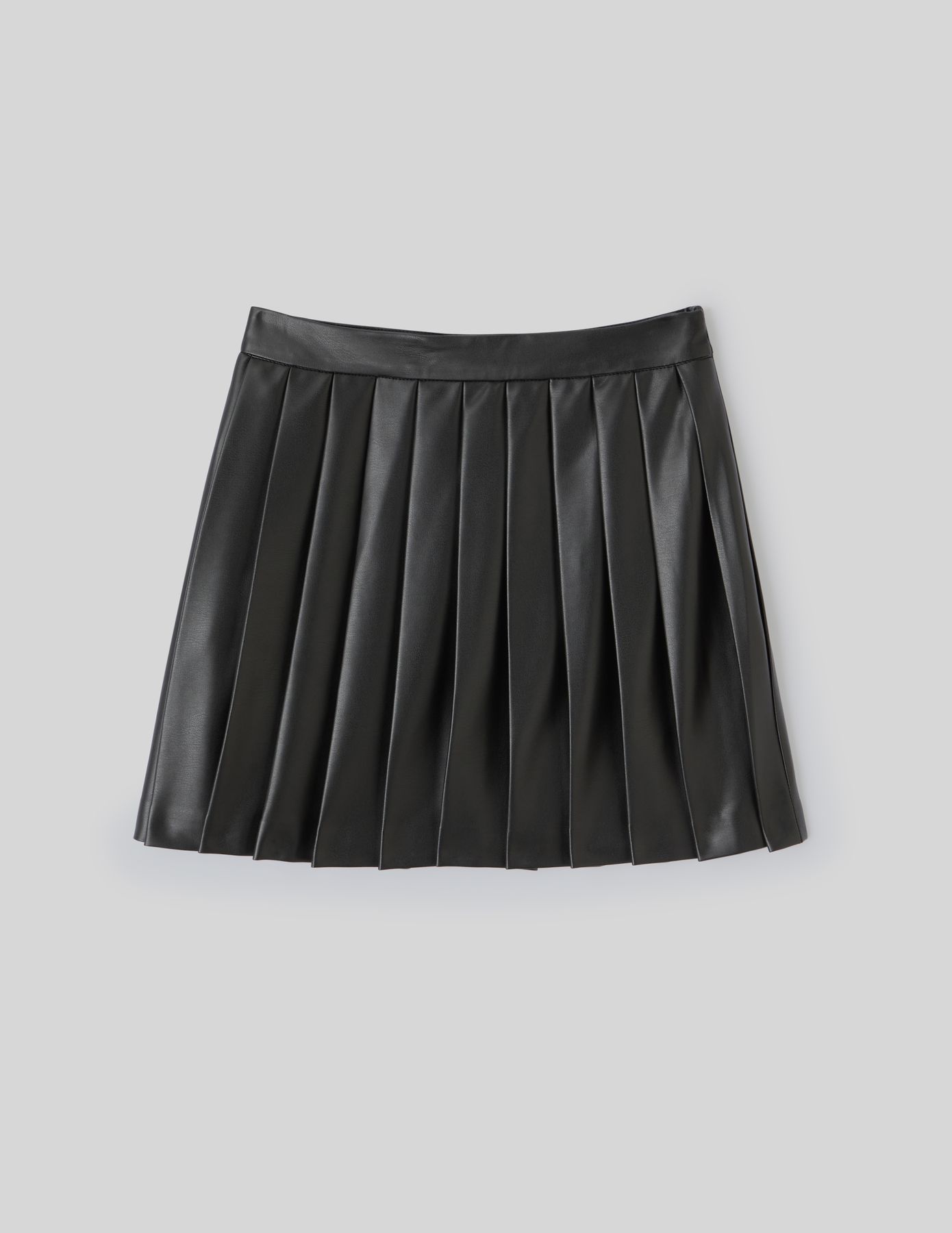 Jupe plissée en tissu enduit