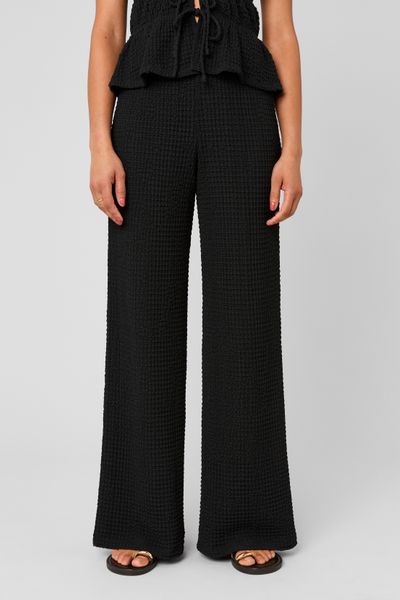 Pantalon fluide mati&egrave;re textur&eacute;e