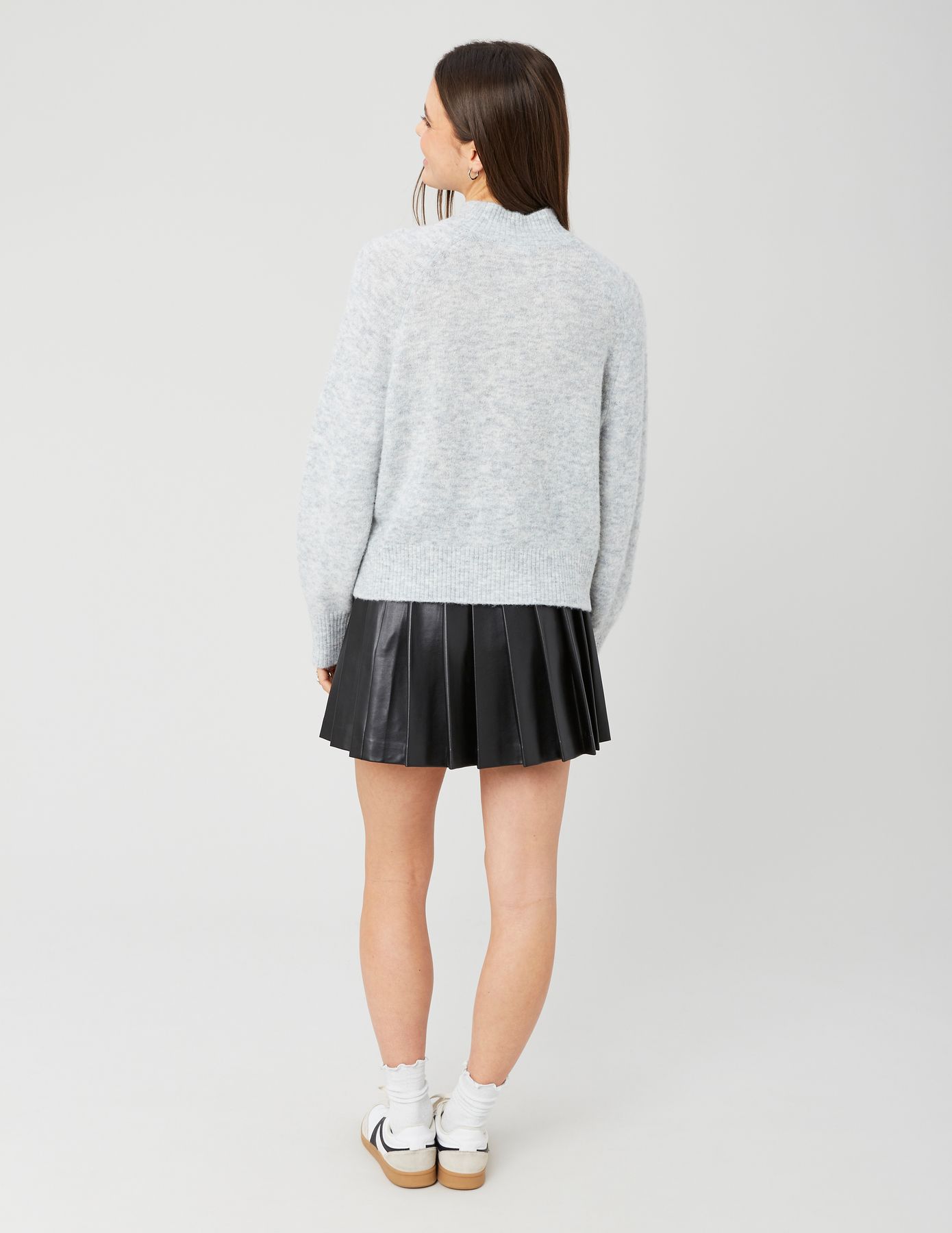 Jupe plissée en tissu enduit