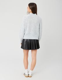 Jupe plissée en tissu enduit