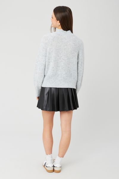 Jupe plissée en tissu enduit