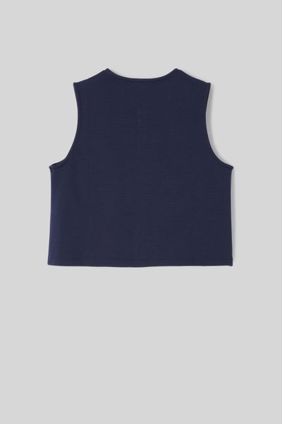 Top avec d&eacute;tails de boutons dor&eacute;s