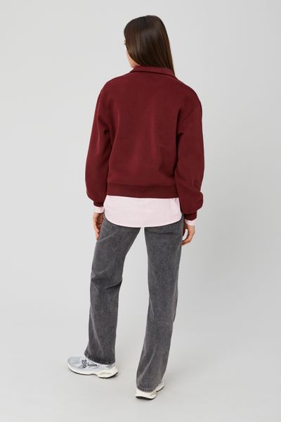 Sweat col polo broderie poitrine