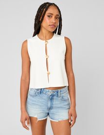 Top avec d&eacute;tails de boutons dor&eacute;s