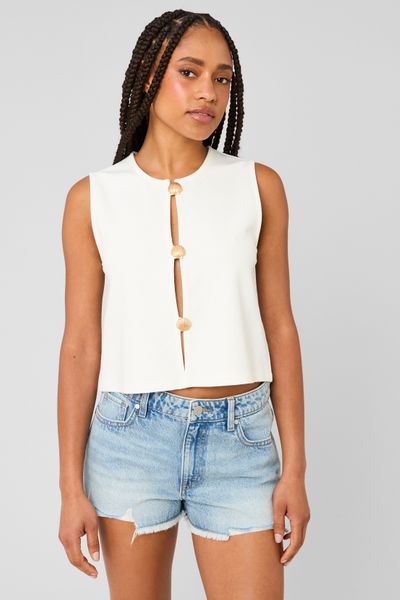 Top avec d&eacute;tails de boutons dor&eacute;s